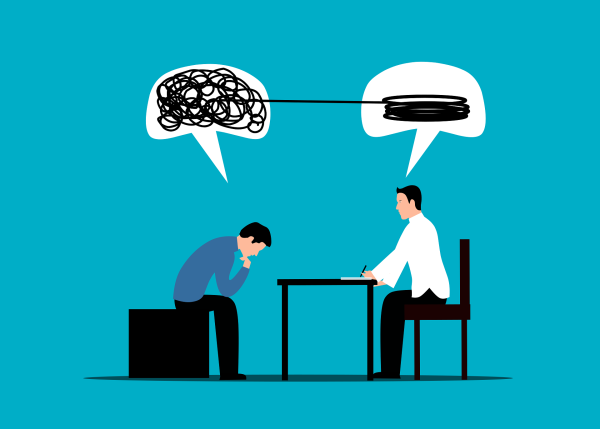 Grafika prezentujące spotkanie coachingowe